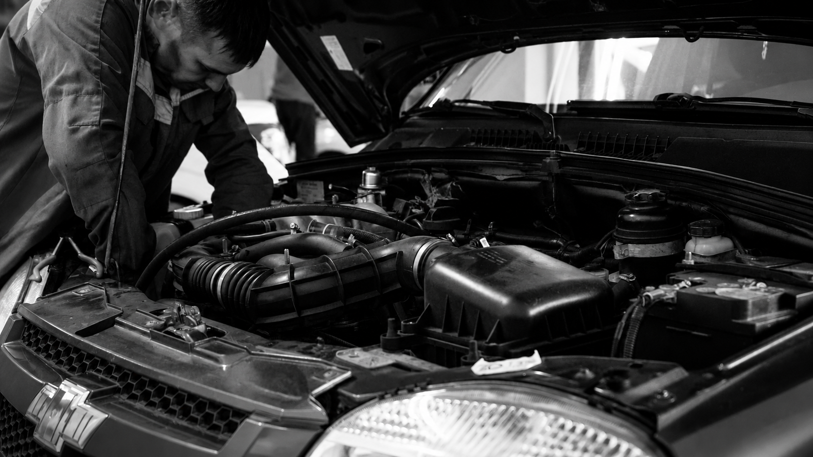 Mechanic working on engine